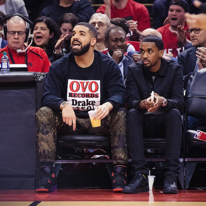 drake wearing raptors 4s