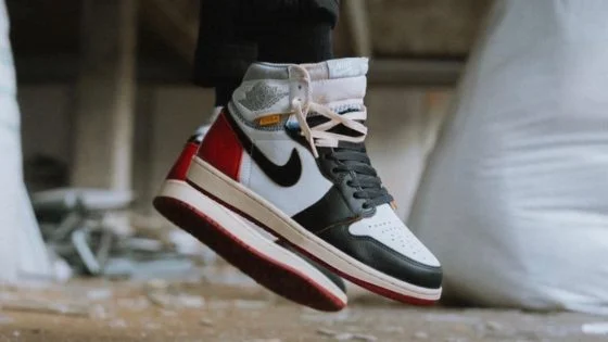 Jordan 1 black toe fake best sale