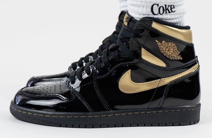 black and gold jordan 1s