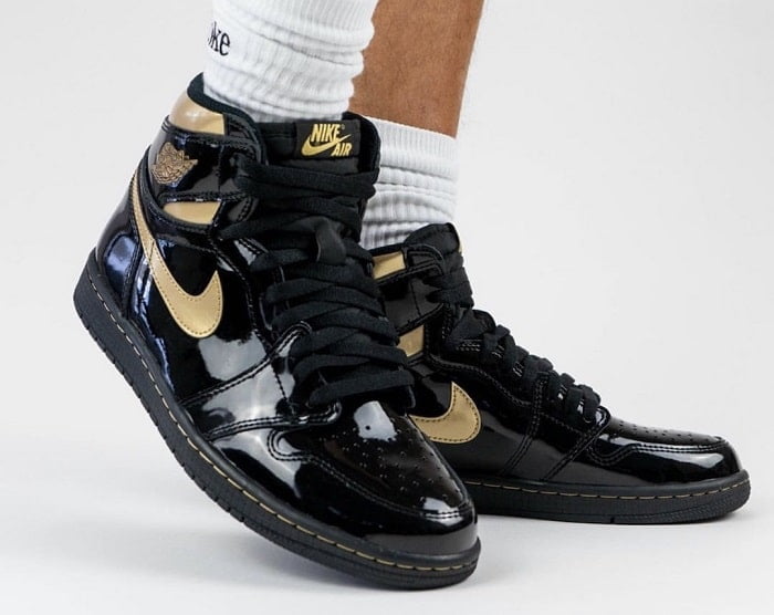 black and gold jordan 1s