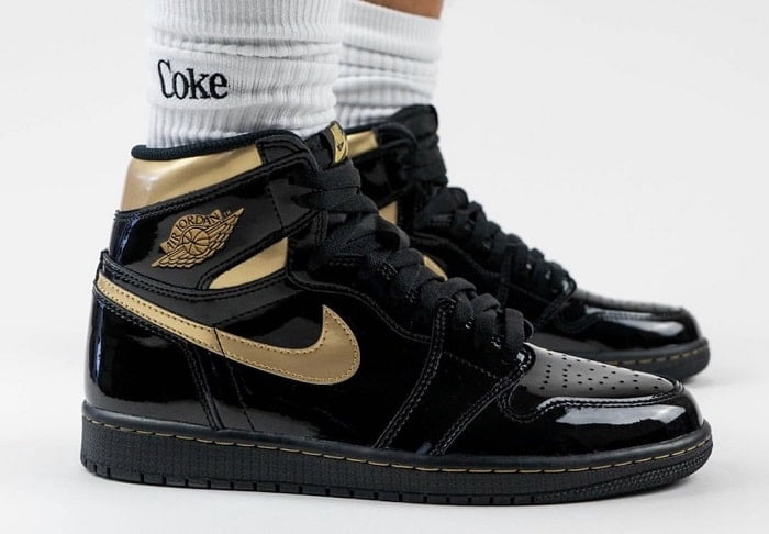 black and gold low top 1s