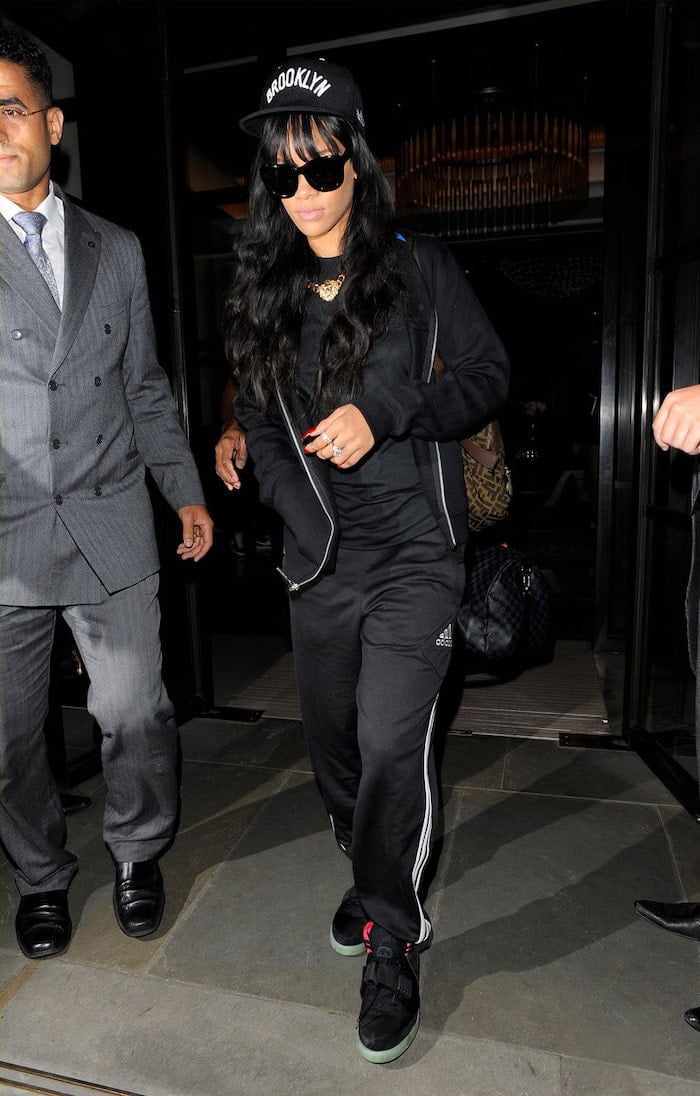 Rihanna Wearing the Nike Air Yeezy 2 Solar Red-min
