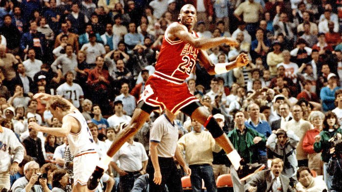 Michael Jordan wearing the Air Jordan 4 Bred
