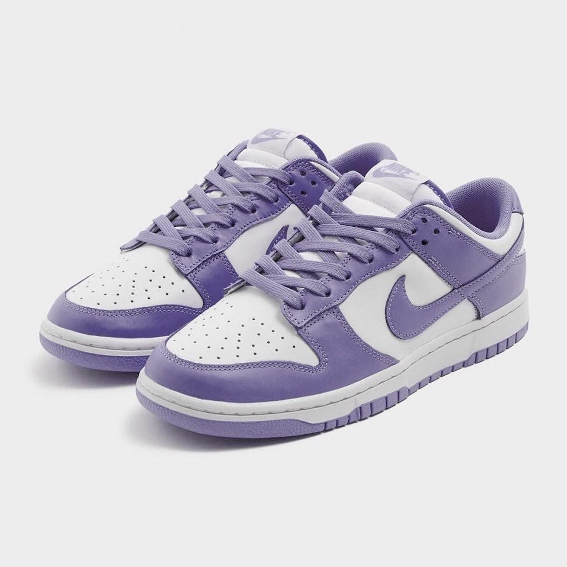 white and purple dunks